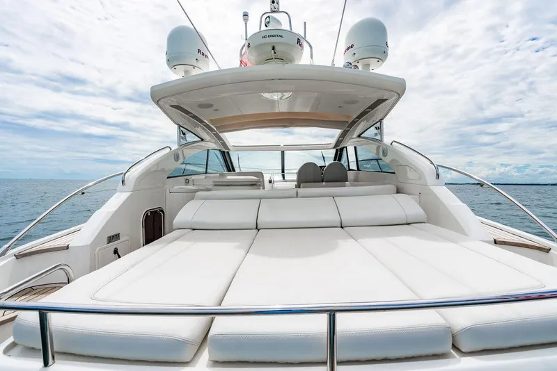 Slide: The Image of Luxurious 2012 Princess V45 yacht with spacious sunbed on open sea. - 12