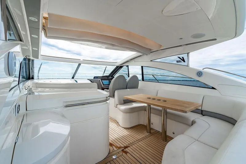 Slide: The Image of Luxurious interior of 2012 Princess V45 yacht with elegant seating and wooden table. - 14