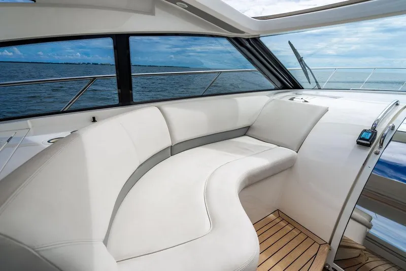 Slide: The Image of Luxurious 2012 Princess V45 yacht interior with white seating and ocean view. - 18