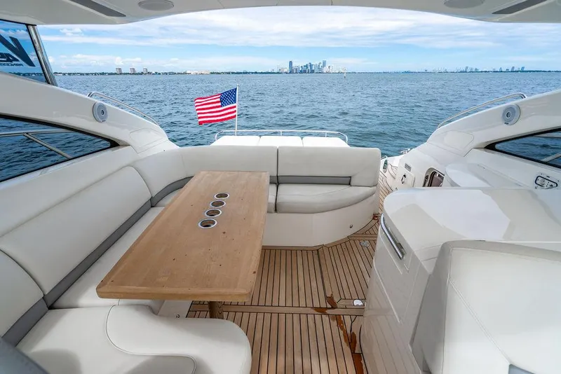 Slide: The Image of Luxurious 2012 Princess V45 yacht interior with ocean view and American flag. - 2