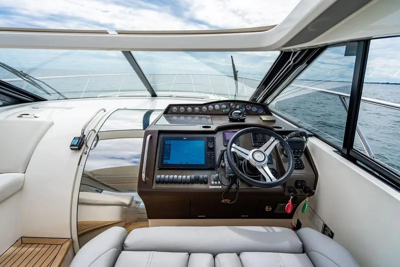 Slide: The Image of Interior helm of 2012 Princess V45 yacht with modern navigation equipment. - 20