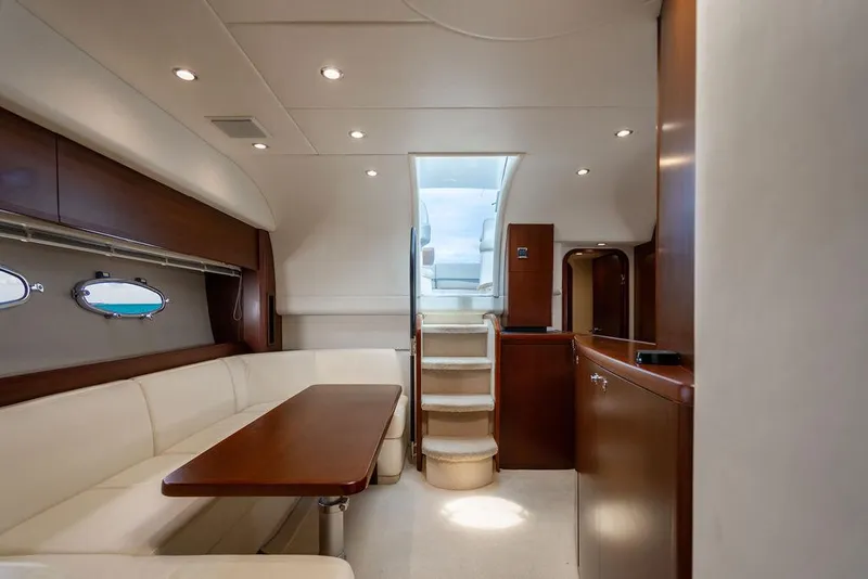 Slide: The Image of Luxurious interior of 2012 Princess V45 yacht with elegant seating and wooden finishes. - 23