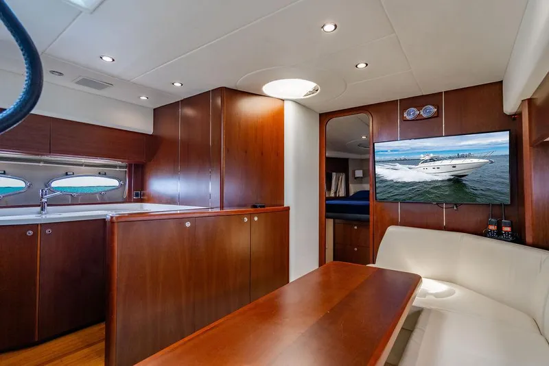 Slide: The Image of Luxurious interior of 2012 Princess V45 yacht with wood finishes and modern amenities. - 24