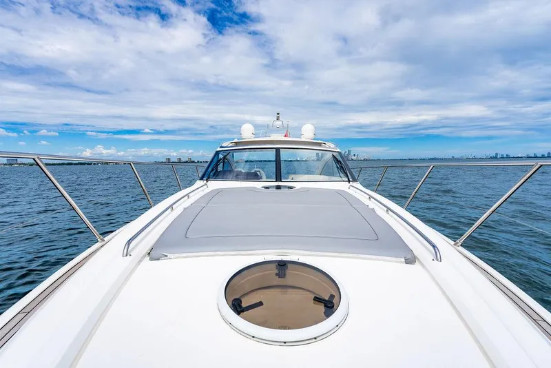 Slide: The Image of Princess V45 yacht cruising on open water under a blue sky, 2012 model. - 37