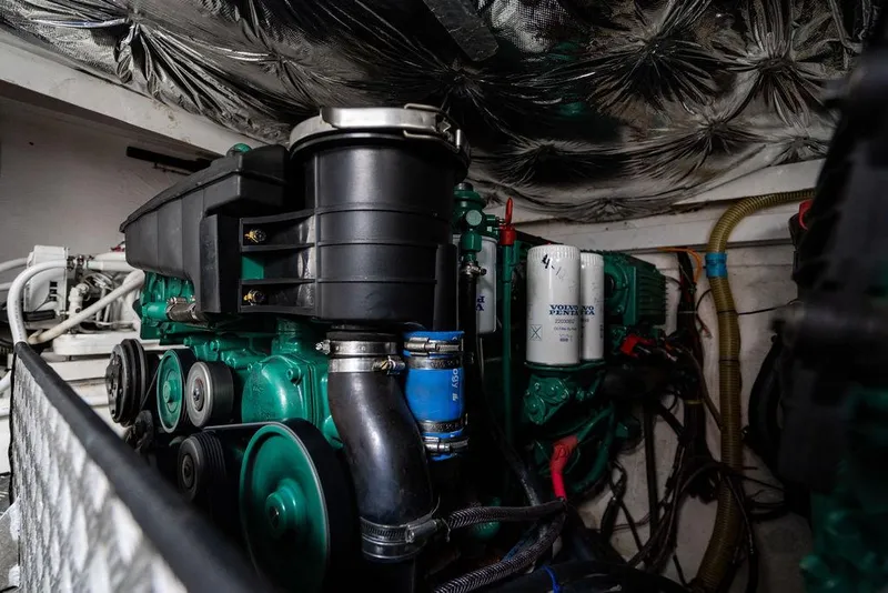 Slide: The Image of Engine room of 2012 Princess V45 yacht, featuring mechanical components and insulation. - 41