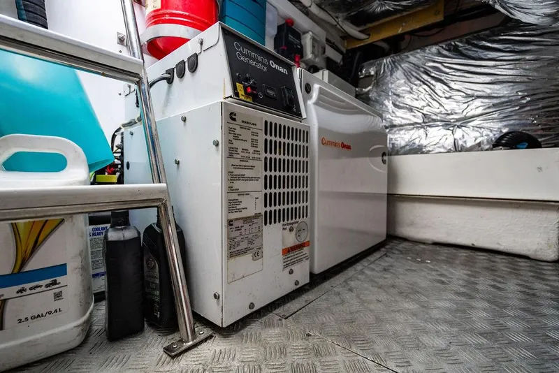 Slide: The Image of Engine room of 2012 Princess V45 yacht with Cummins Onan generator. - 42