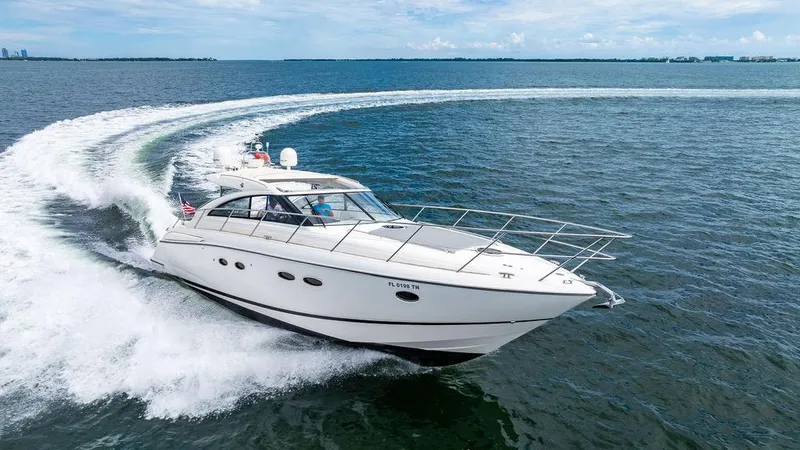 Slide: The Image of 2012 Princess V45 yacht cruising on open water. - 43