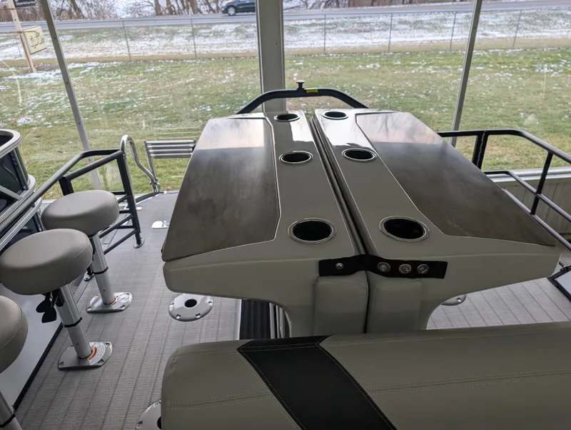 Slide: The Image of 2025 Sylvan L3 DLZ Bar interior with bar stools and table setup. - 7