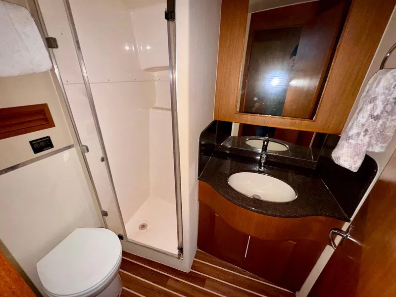 Slide: The Image of 2011 Henriques 42 Sportfisherman bathroom with shower, sink, and toilet. - 12