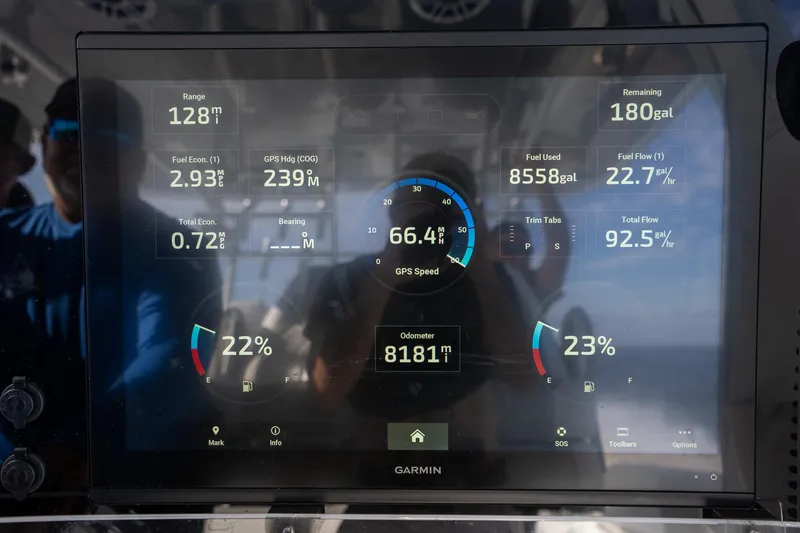 Slide: The Image of Garmin display on Freeman 42 LR boat showing speed, fuel, and trip data. - 13