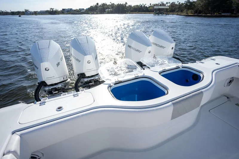 Slide: The Image of 2023 Freeman 42 LR boat with Mercury engines on a sunny lake. - 20