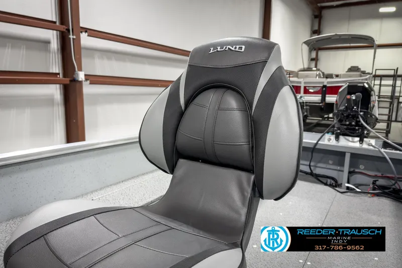Slide: The Image of 2025 Lund 1600 Fury Heritage Edition boat seat in showroom. - 19
