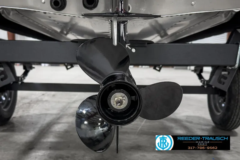 Slide: The Image of 2025 Lund 1600 Fury Heritage Edition boat propeller and trailer detail. - 23