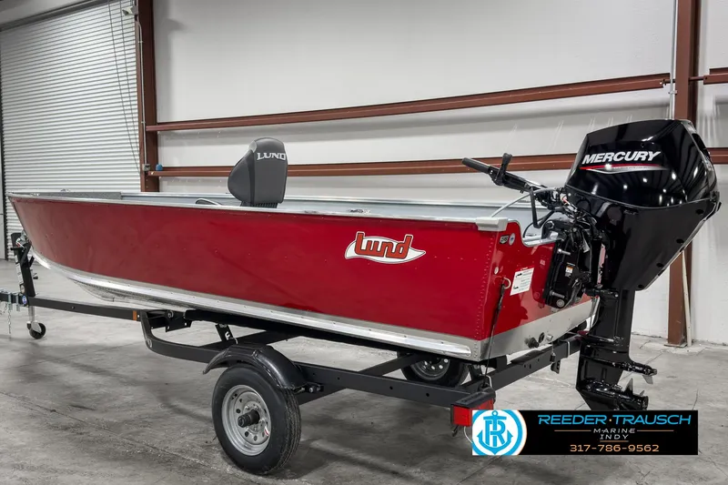 Slide: The Image of 2025 Lund 1600 Fury Heritage Edition boat with Mercury engine on trailer. - 4