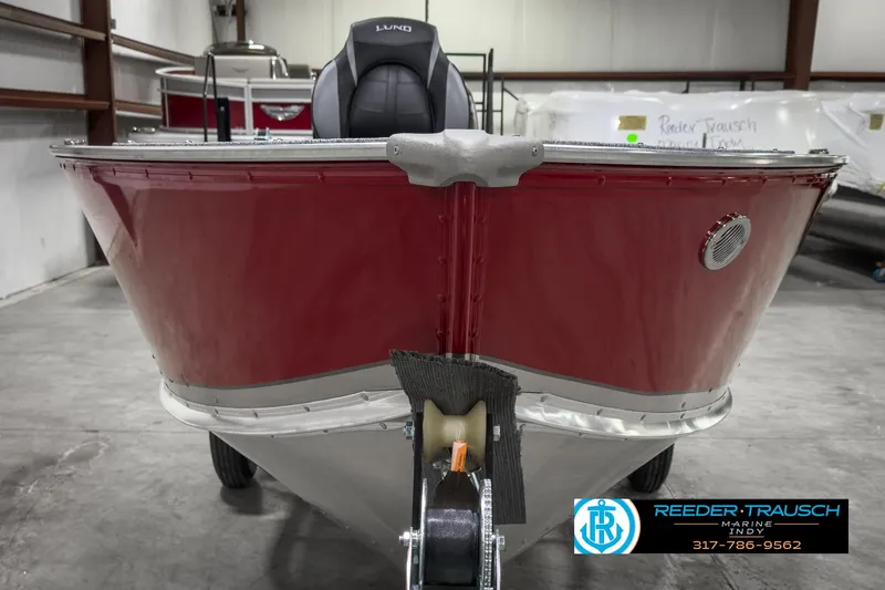 Slide: The Image of 2025 Lund 1600 Fury Heritage Edition boat in a showroom, front view. - 6