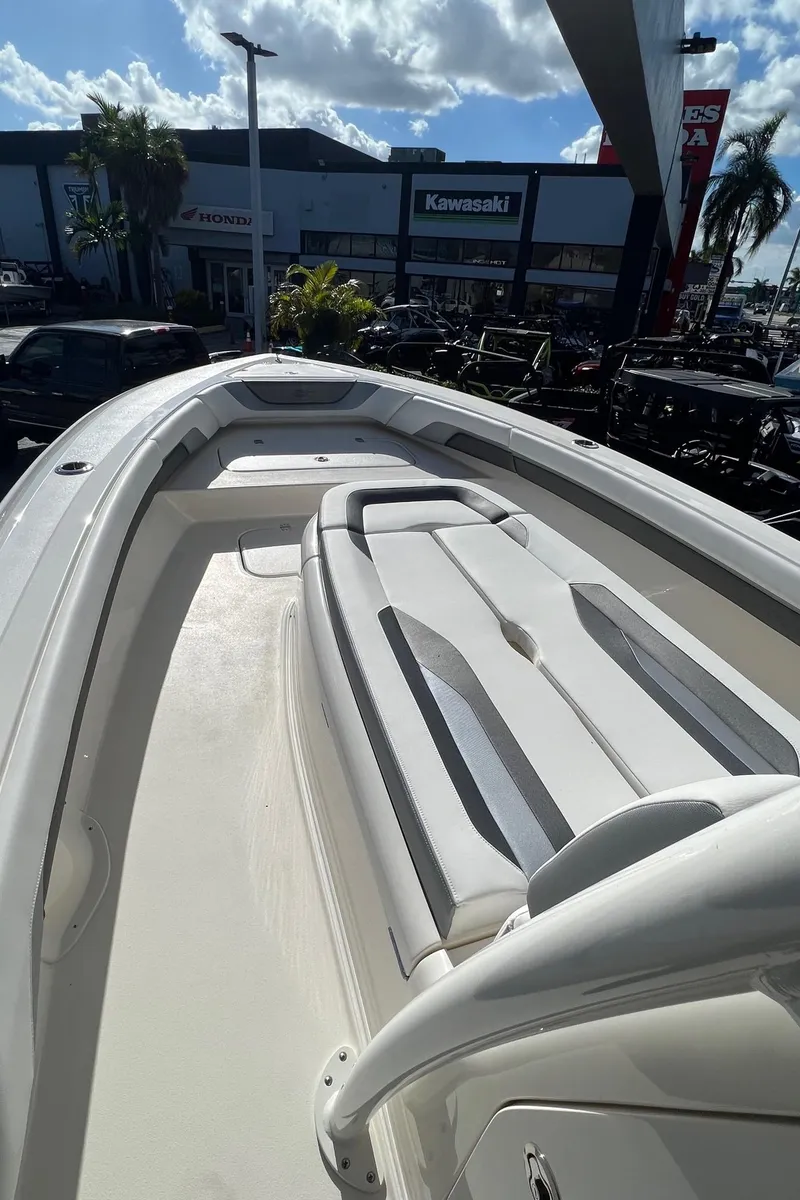 Slide: The Image of 2024 ShearWater 270 SS Open Carolina boat with spacious seating and sleek design. - 7