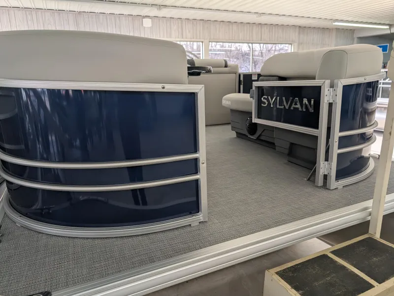 Slide: The Image of 2025 Sylvan Mirage Fish 8520 Party Fish pontoon boat interior with seating. - 2