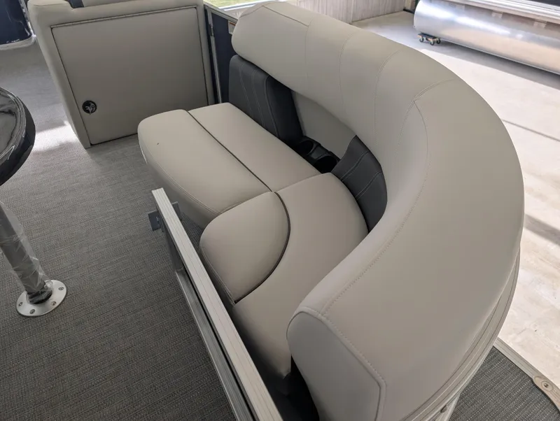 Slide: The Image of 2025 Sylvan Mirage Fish 8520 Party Fish boat interior with curved seating. - 4