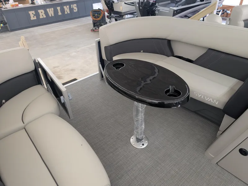 Slide: The Image of 2025 Sylvan Mirage Fish 8520 Party Fish interior with seating and table. - 6
