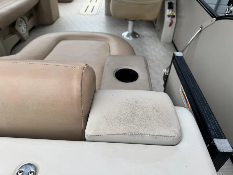 Slide: The Image of 2017 Avalon Catalina Rear J Lounger interior with beige seating and cup holder. - 15