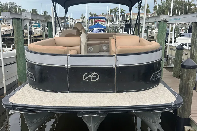 Slide: The Image of 2017 Avalon Catalina Rear J Lounger boat docked at marina. - 6