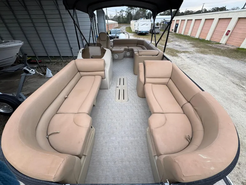 Slide: The Image of 2017 Avalon Catalina Rear J Lounger boat with spacious seating and canopy. - 8