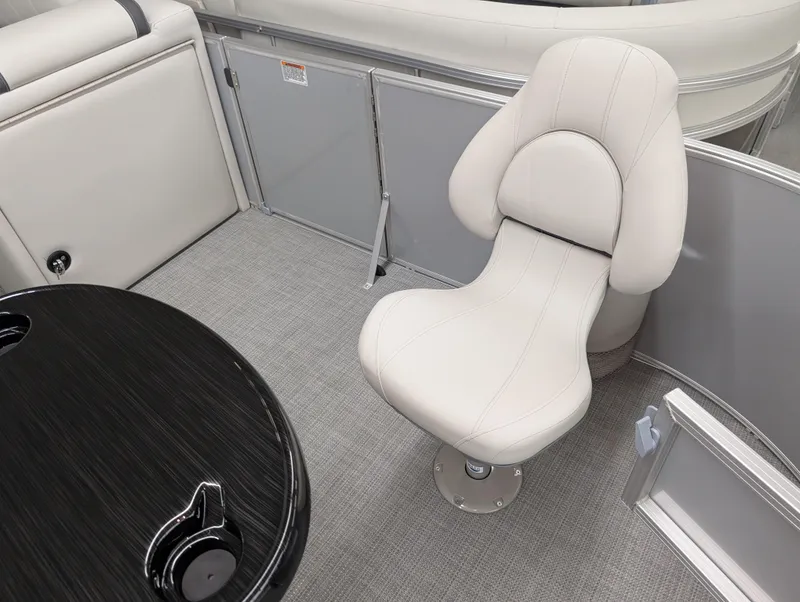 Slide: The Image of Luxurious seating on 2025 Sylvan Mirage Fish 820 Party Fish boat interior. - 4