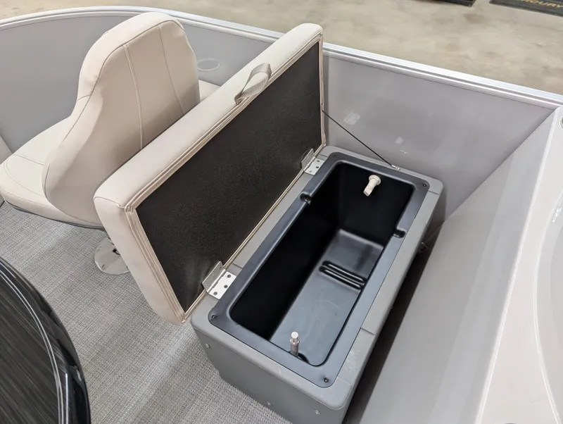 Slide: The Image of 2025 Sylvan Mirage Fish 820 Party Fish boat interior with storage compartment. - 5