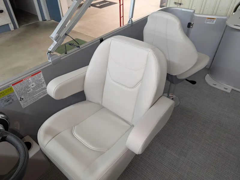 Slide: The Image of 2025 Sylvan Mirage Fish 820 Party Fish boat with comfortable white seating. - 7