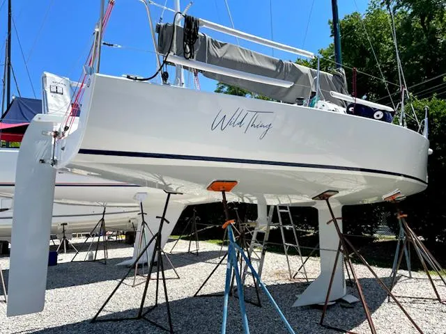 Slide: The Image of 2021 J Boats J 88 sailboat "Wild Thing" on stands in a boatyard. - 3