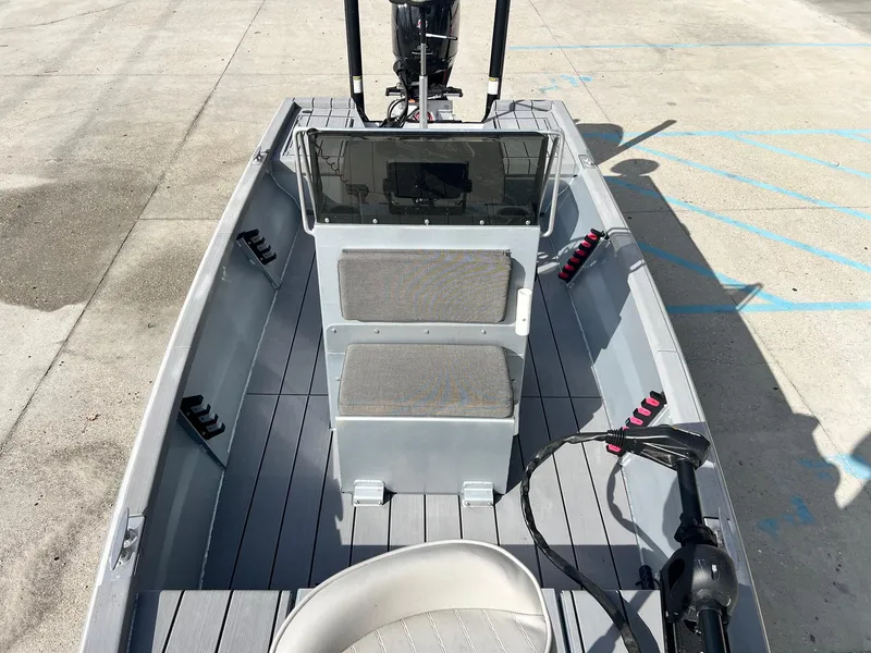 Slide: The Image of 2022 Hanko 185 CCLS boat interior with seating and steering console. - 11