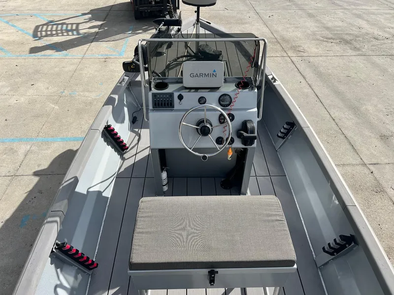 Slide: The Image of 2022 Hanko 185 CCLS boat interior with Garmin navigation system and steering console. - 7