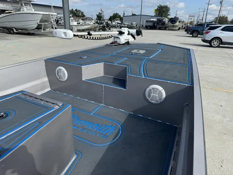 Slide: The Image of Custom Cottonmouth 1860 boat interior, 2022 model, featuring speakers and storage compartments. - 15