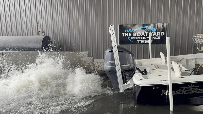 Slide: The Image of 2019 NauticStar 244 XTS boat undergoing performance test with Yamaha engine. - 12