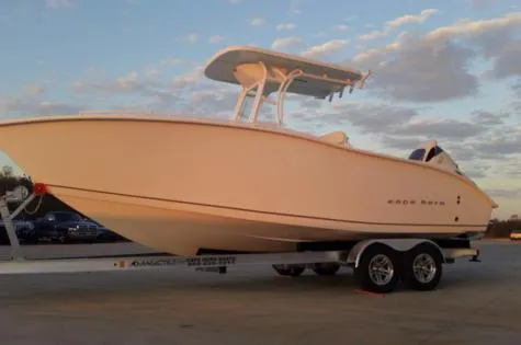 Slide: The Image of 2024 Cape Horn 22OS boat on trailer at sunset. - 3