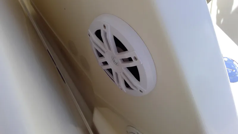 Slide: The Image of White speaker on 1993 Tiara Yachts 3100 Open boat interior. - 11