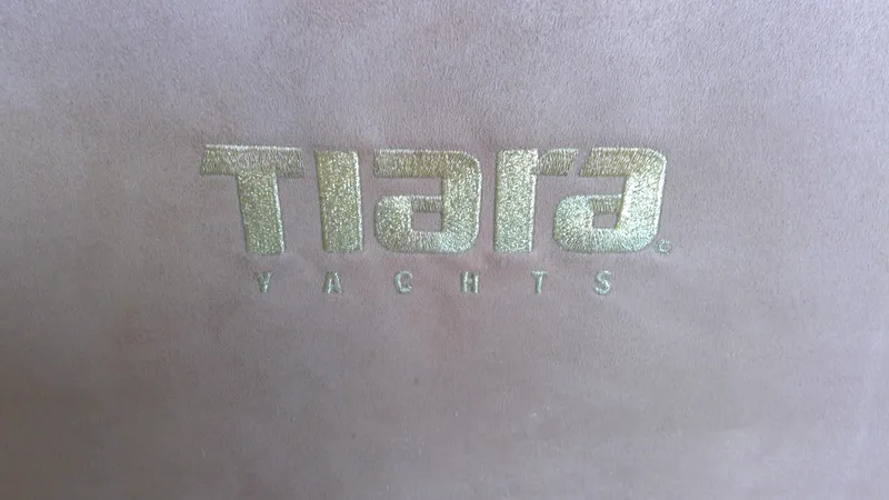 Slide: The Image of Tiara Yachts logo on a 1993 Tiara 3100 Open model. - 32