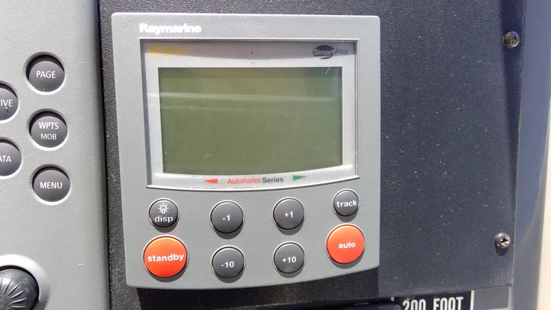 Slide: The Image of Raymarine autopilot control panel on 1993 Tiara Yachts 3100 Open. - 47