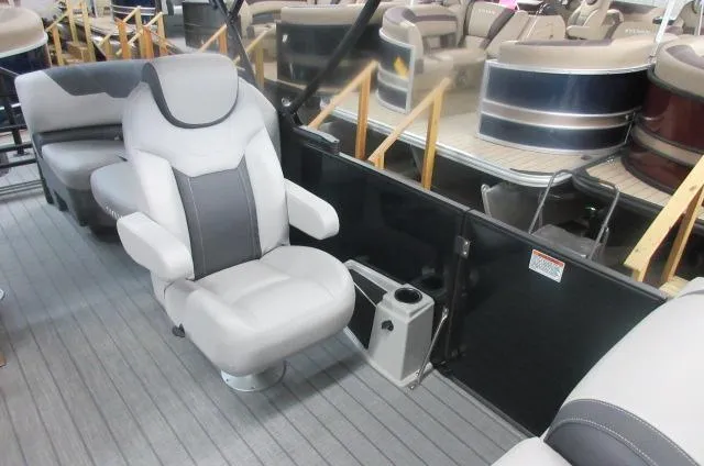 Slide: The Image of 2025 Sylvan L1 LZ boat interior with plush seating and modern design. - 11