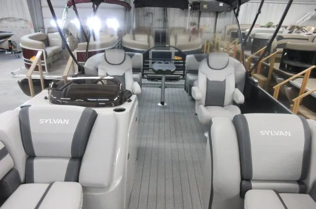 Slide: The Image of 2025 Sylvan L1 LZ pontoon boat interior with gray seating and modern design. - 3