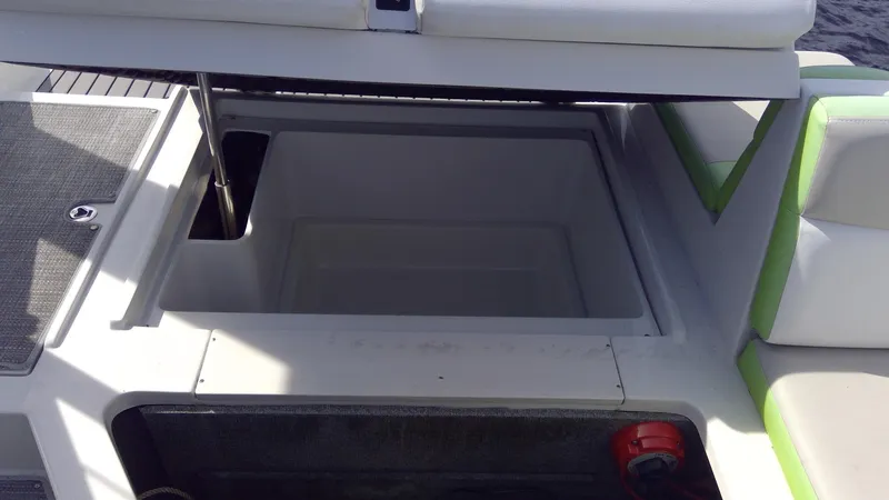 Slide: The Image of Starcraft SCX 240 boat storage compartment, 2017 model, open and empty. - 16