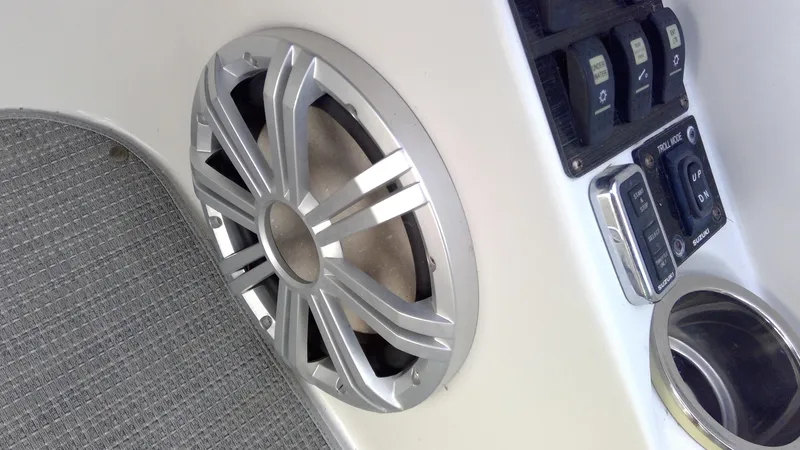 Slide: The Image of Starcraft SCX 240 boat interior, featuring speaker and control panel, 2017 model. - 23