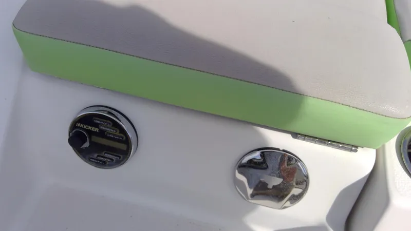 Slide: The Image of 2017 Starcraft SCX 240 boat seat with control panel and chrome detail. - 28