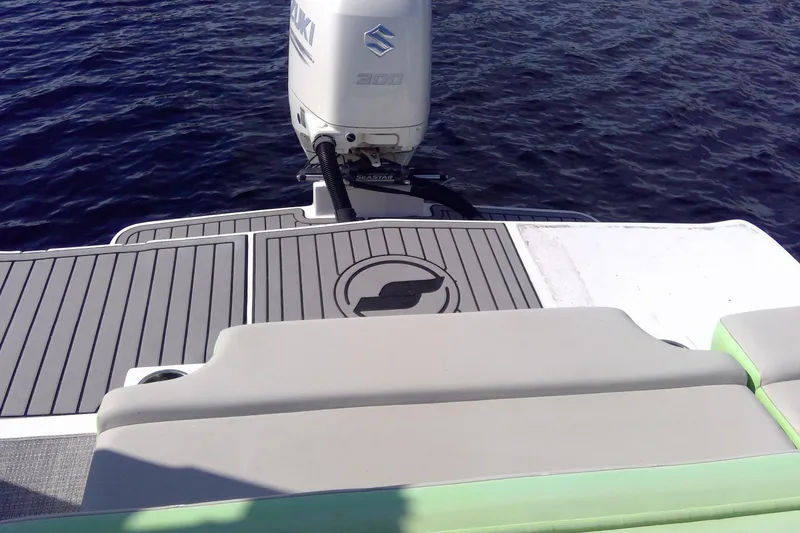 Slide: The Image of 2017 Starcraft SCX 240 boat with Suzuki outboard motor on calm water. - 36