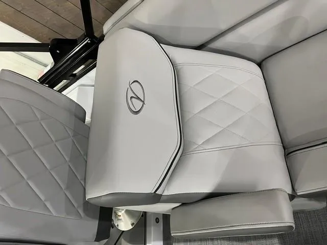 Slide: The Image of 2025 Veranda VX 25 DCRC boat seat with diamond stitching and logo detail. - 15