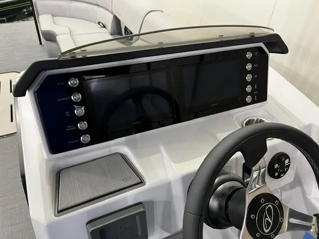 Slide: The Image of Dashboard of 2025 Veranda VX 25 DCRC boat with modern controls and steering wheel. - 18