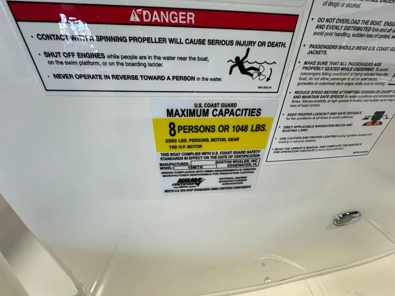 Slide: The Image of Safety warning labels on a 2025 Boston Whaler 190 Montauk boat. - 10