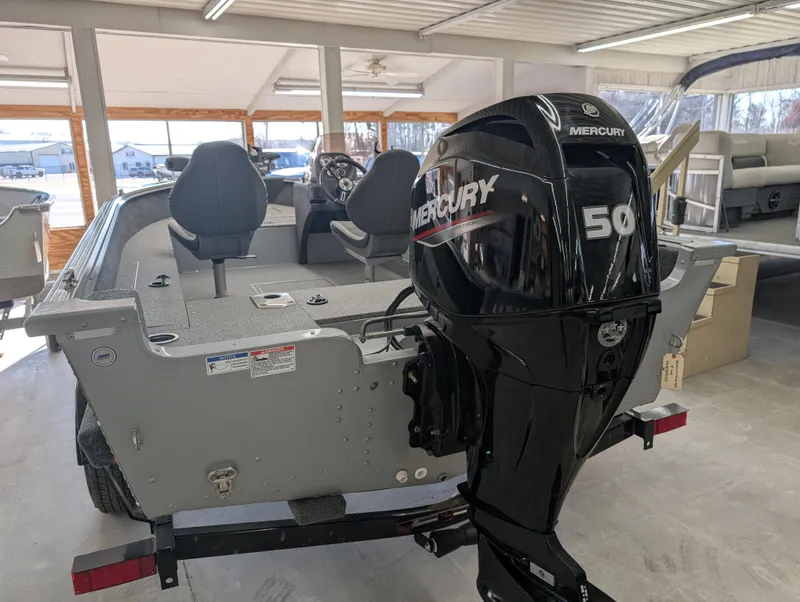 Slide: The Image of 2023 Starcraft Stealth 16 SC boat with Mercury 50 outboard motor in showroom. - 3