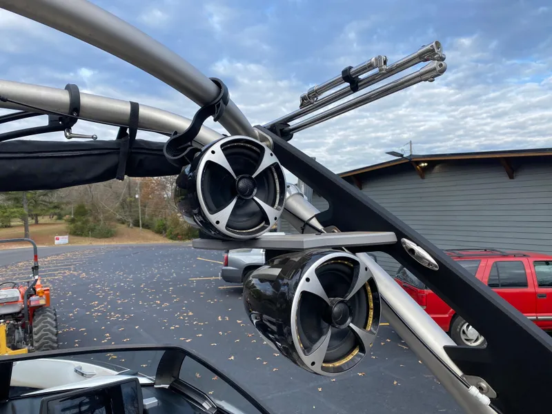 Slide: The Image of 2016 Malibu Wakesetter 23 LSV boat speakers and tower against cloudy sky. - 15