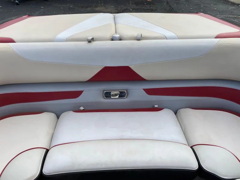 Slide: The Image of 2016 Malibu Wakesetter 23 LSV interior seating with red and white upholstery. - 18